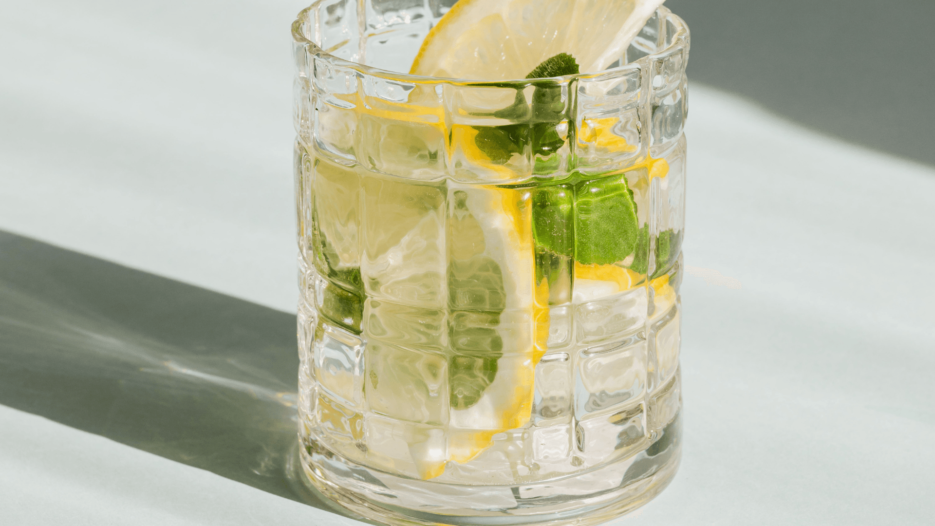 glass with gin and lemon